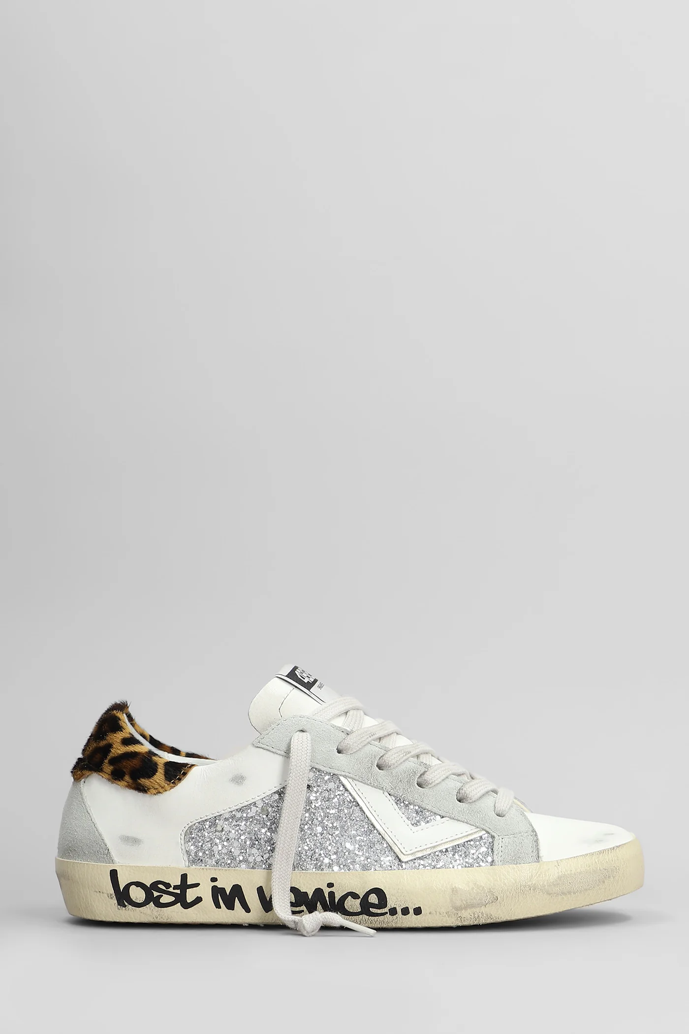Suprime Sneakers in white leather