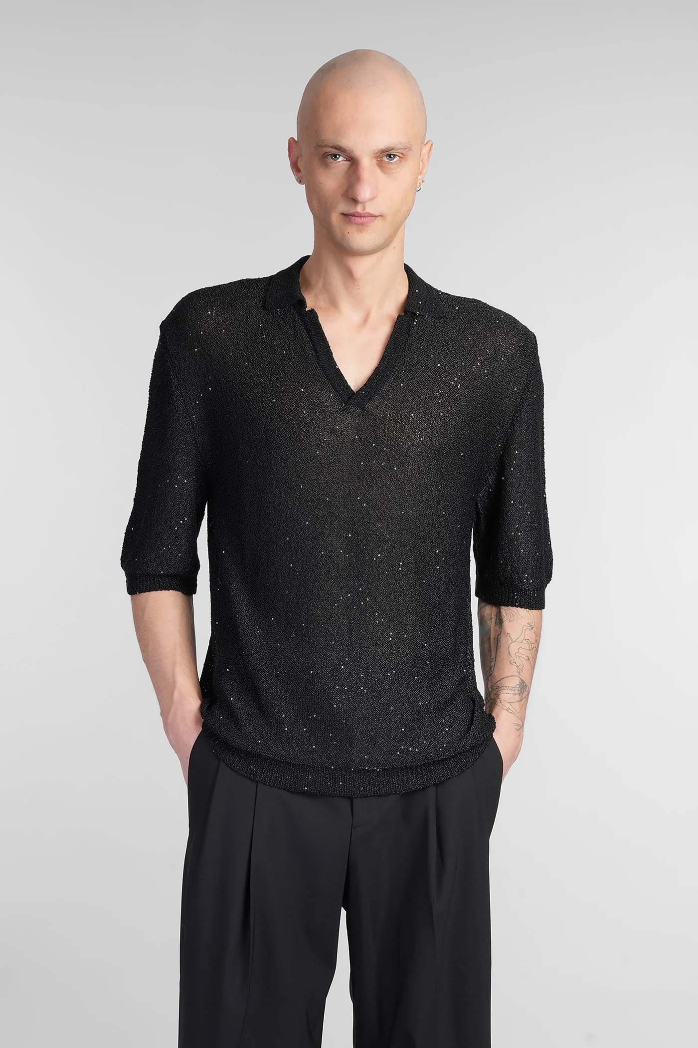 Polo in black polyester