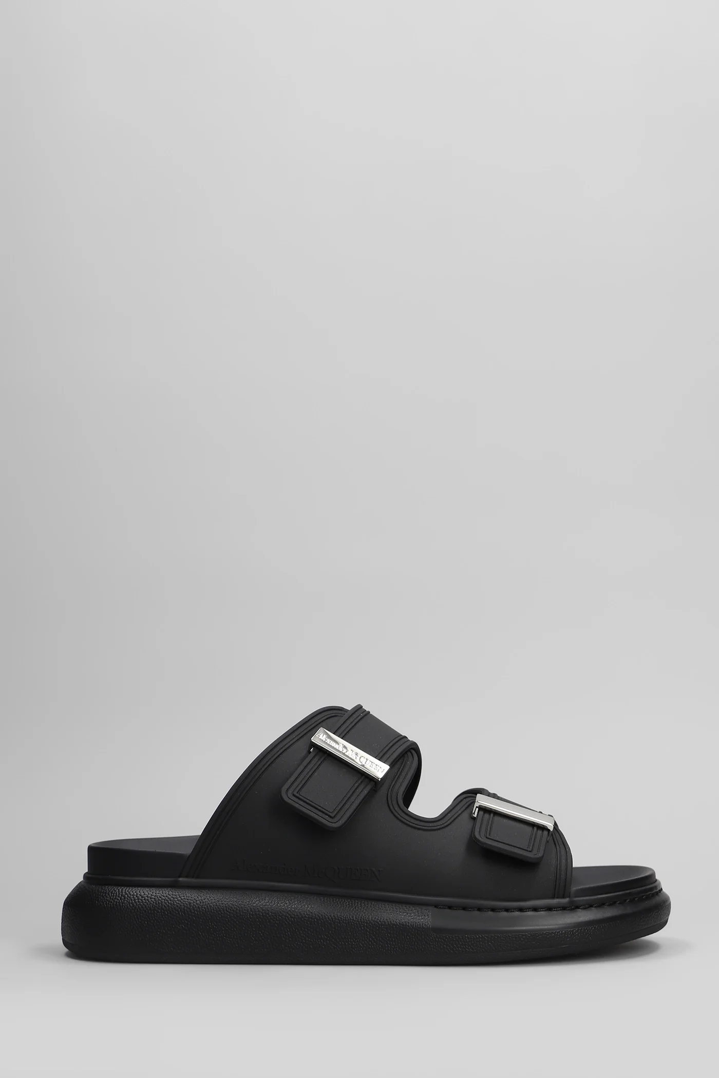 Sandals in black rubber/plasic