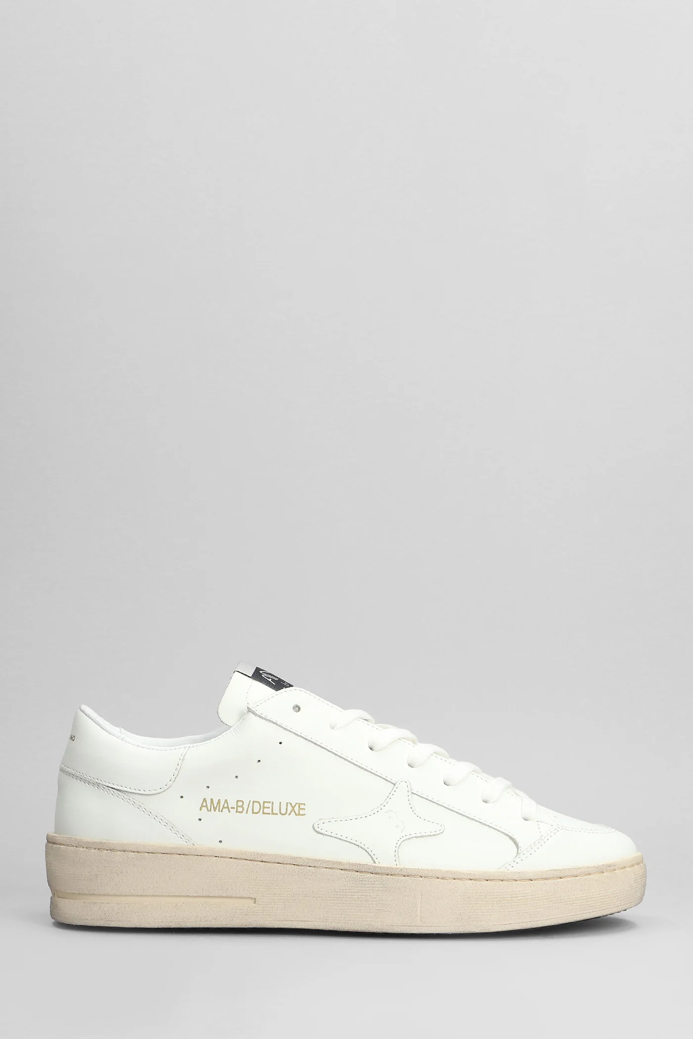 Sneakers in white leather