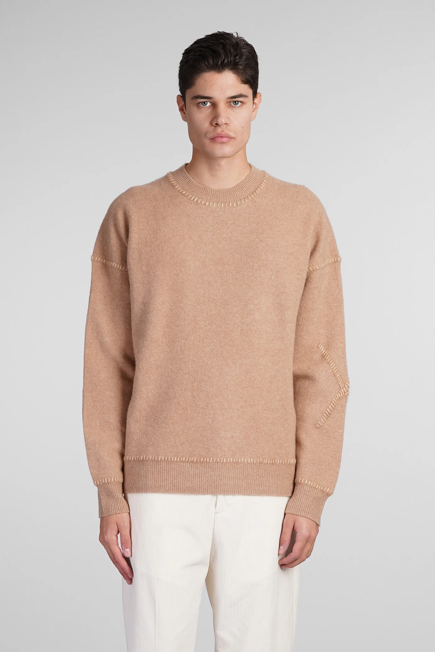 Knitwear in beige wool