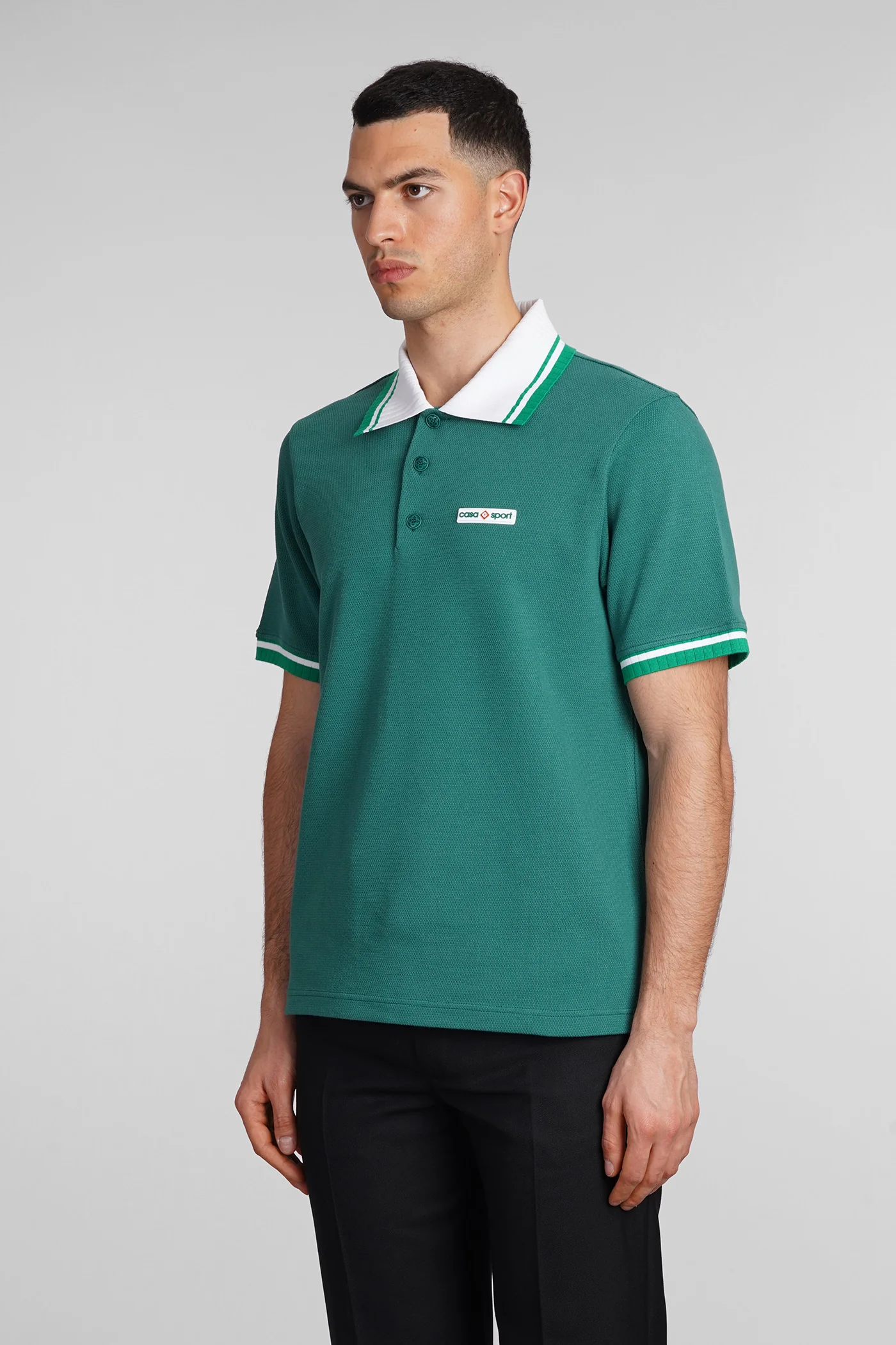 Polo in green cotton - Image 4