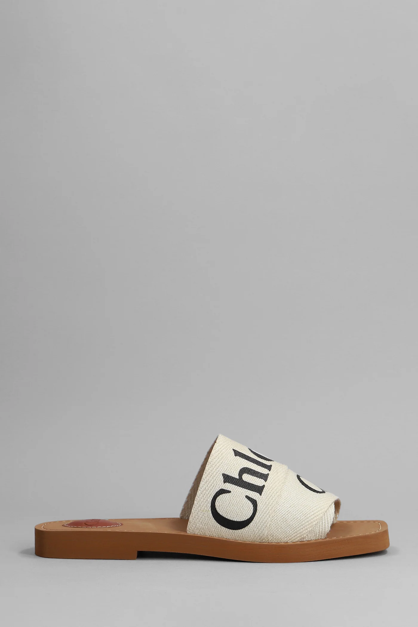 Woody Slipper-Mule in white canvas