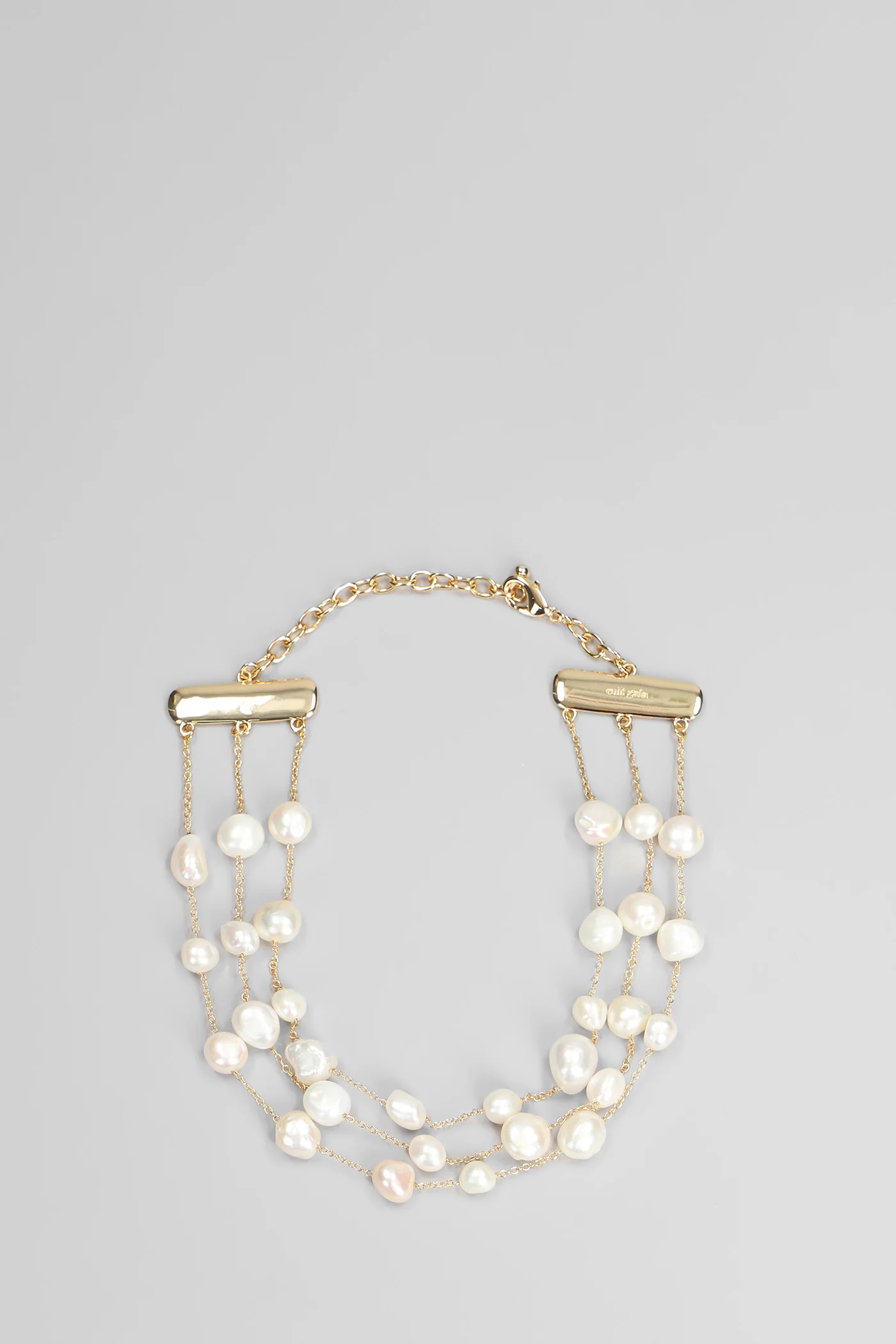 Nyala in beige brass