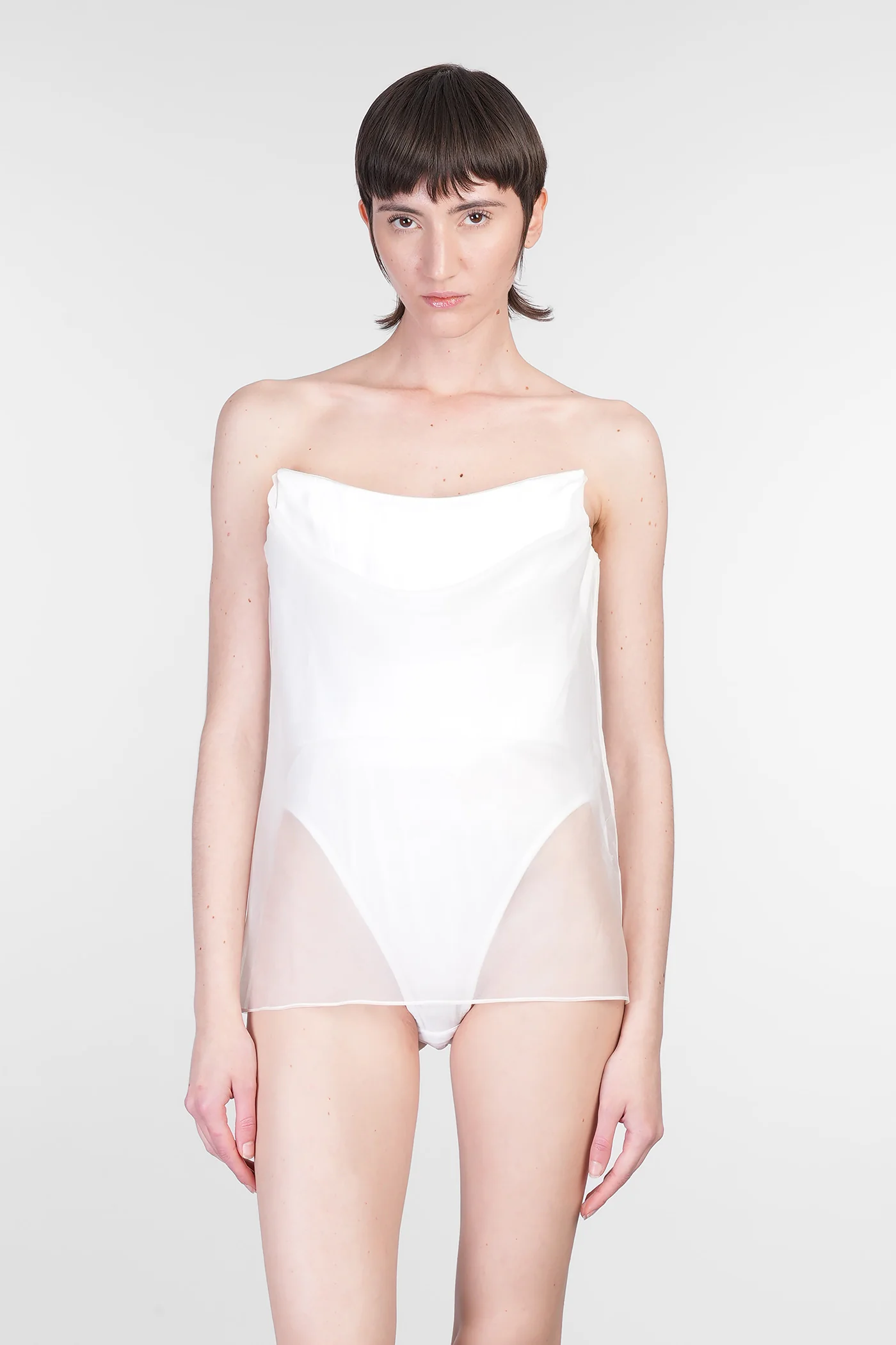 Topwear in white silk