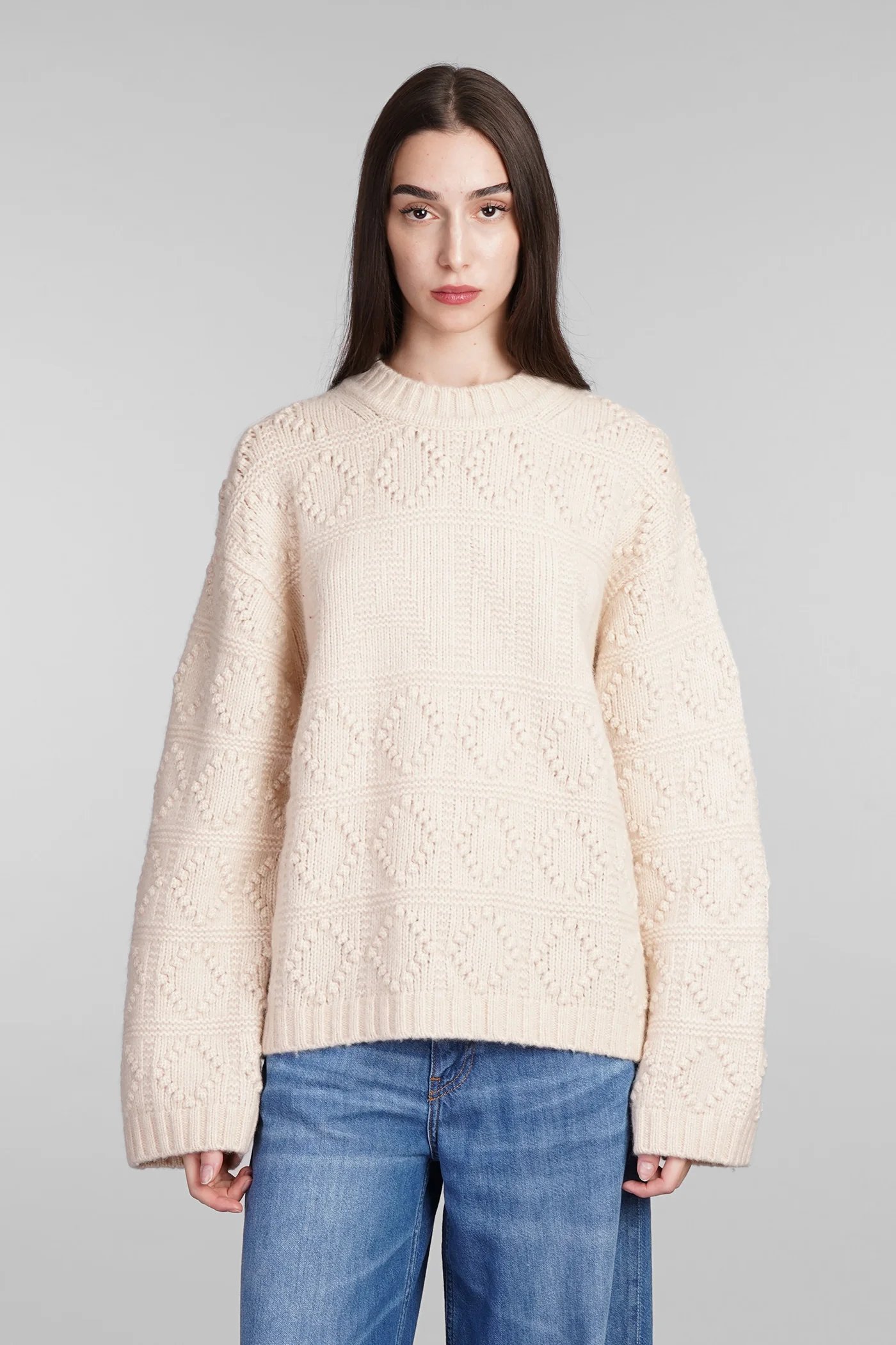 Knitwear in beige wool
