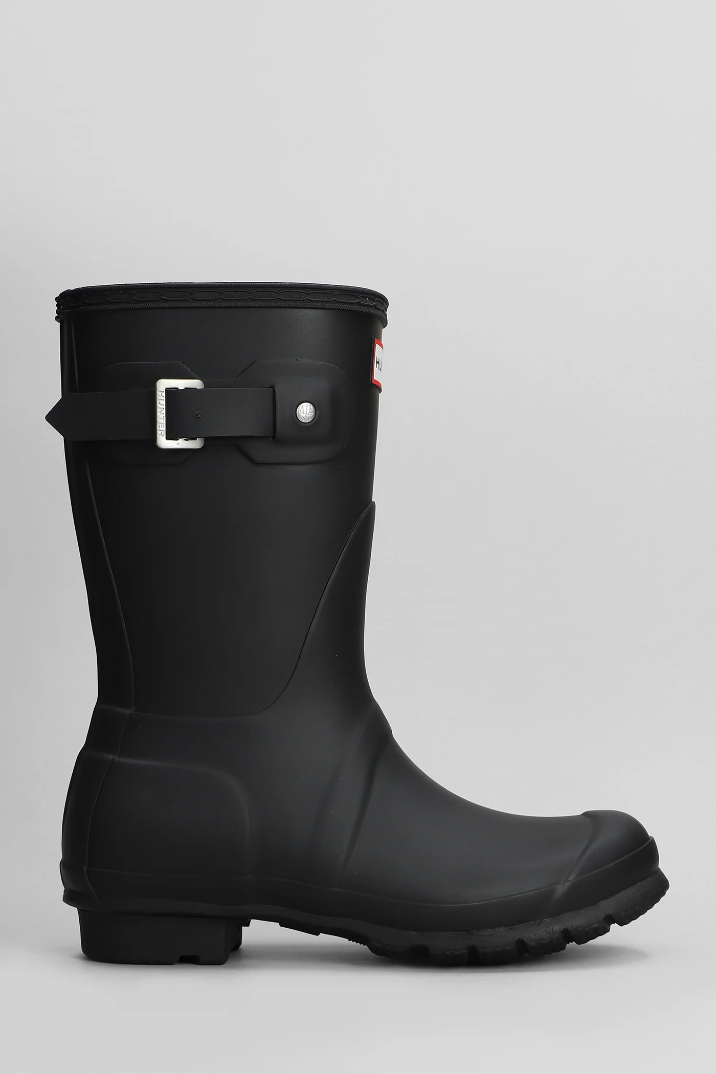 Original short low heels boots in black rubber/plasic