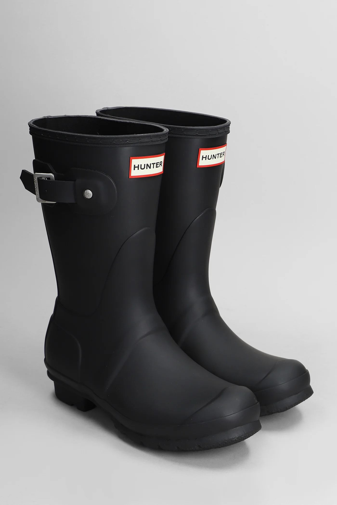 Original short low heels boots in black rubber/plasic - Image 2