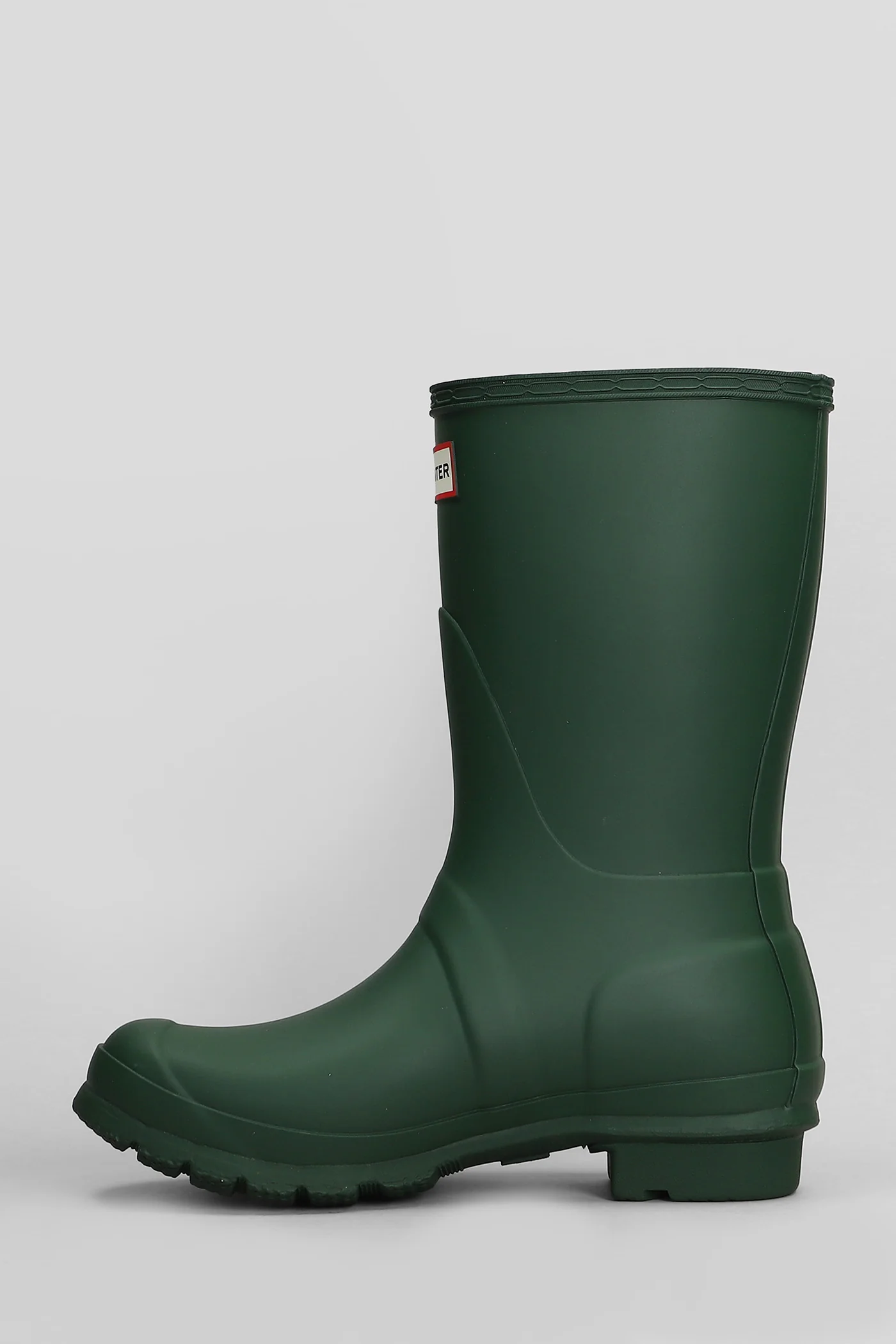 Original short low heels boots in green rubber/plasic - Image 3