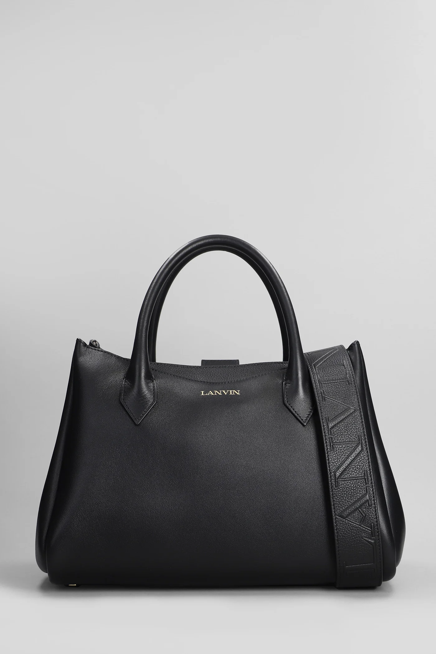 L octave Hand bag in black leather
