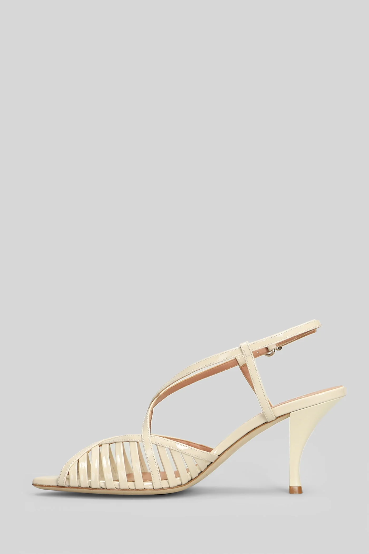 Sandals in beige patent leather - Image 8