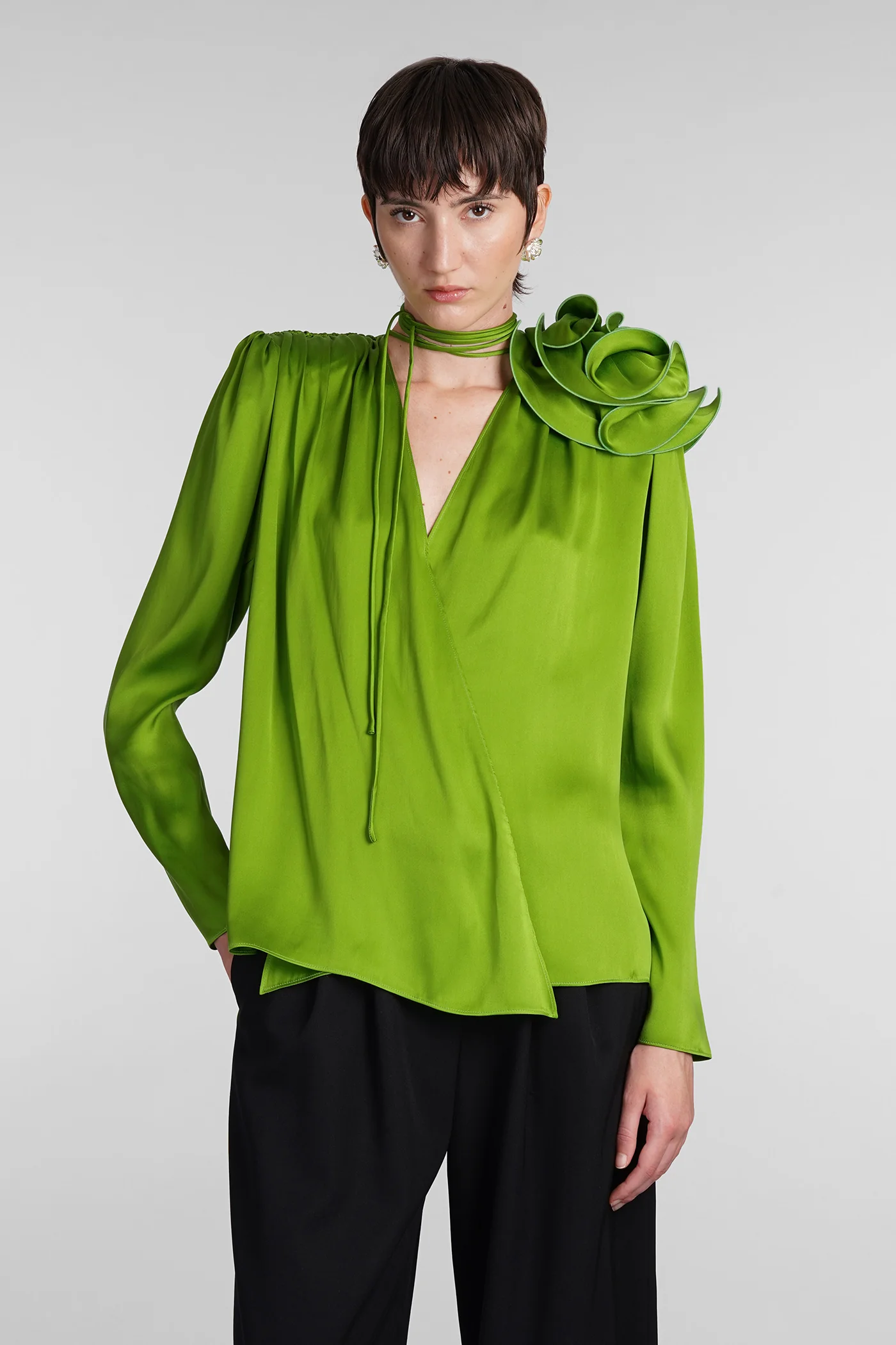 Blouse in green silk