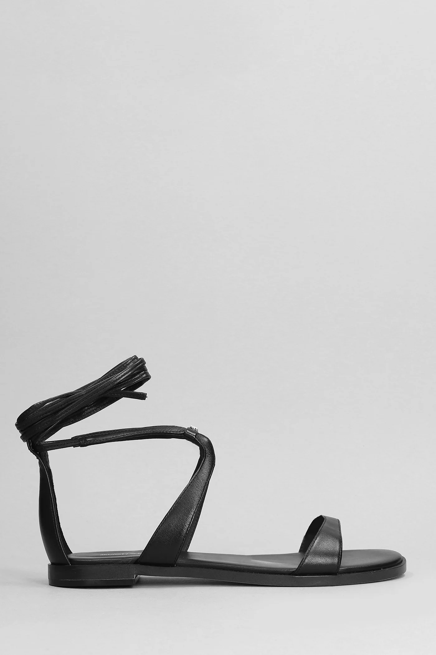 Amara Flats in black leather