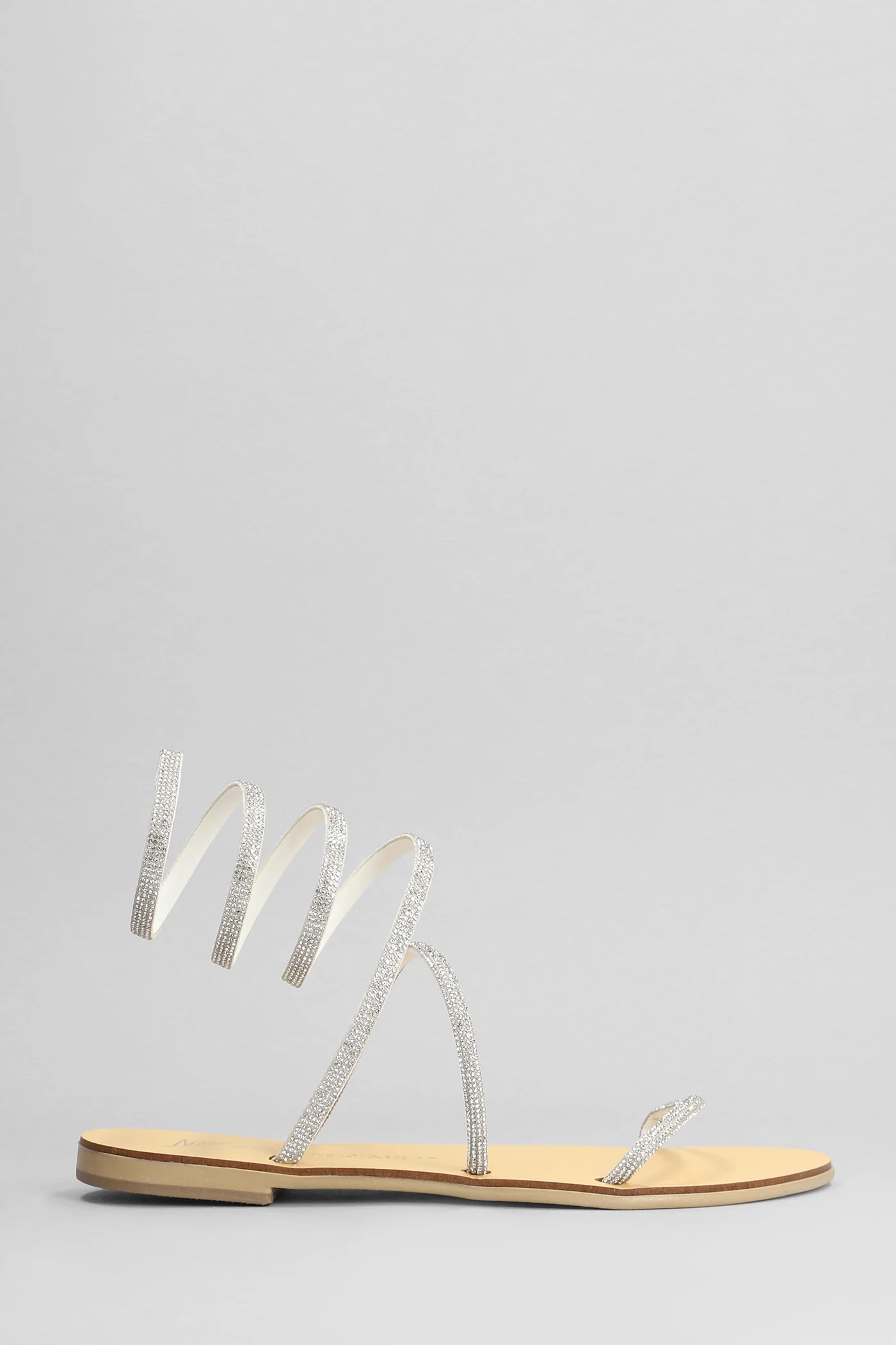 Flats in silver fabric