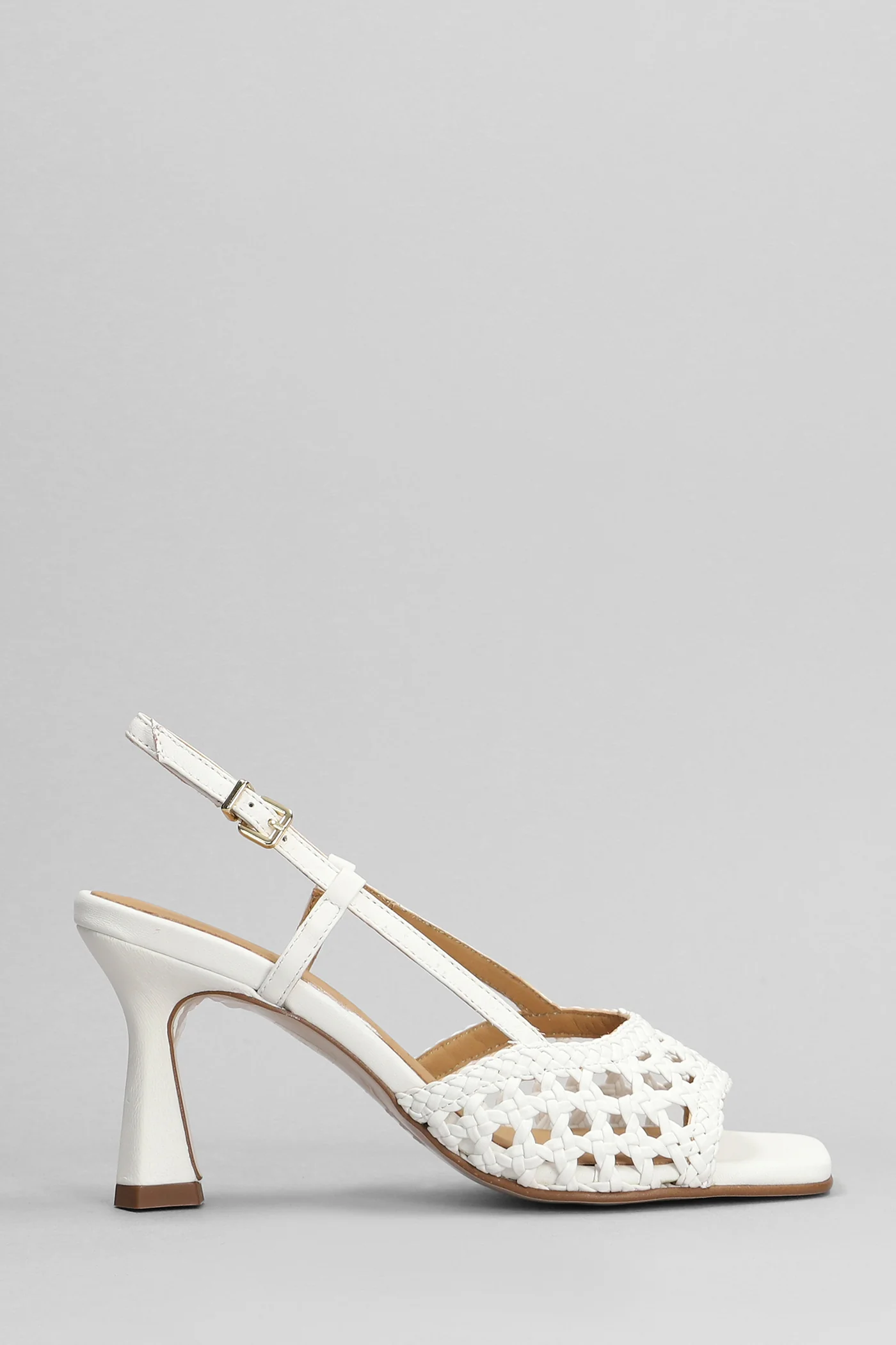 Sandals in white leather