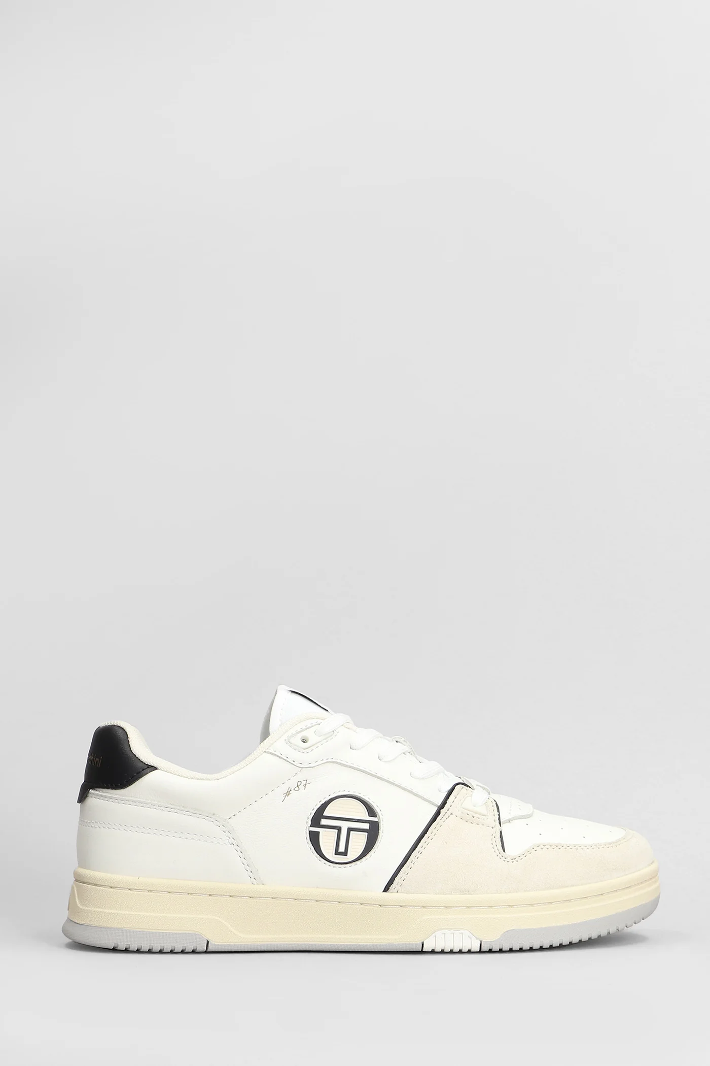 Sneakers in white suede and leather