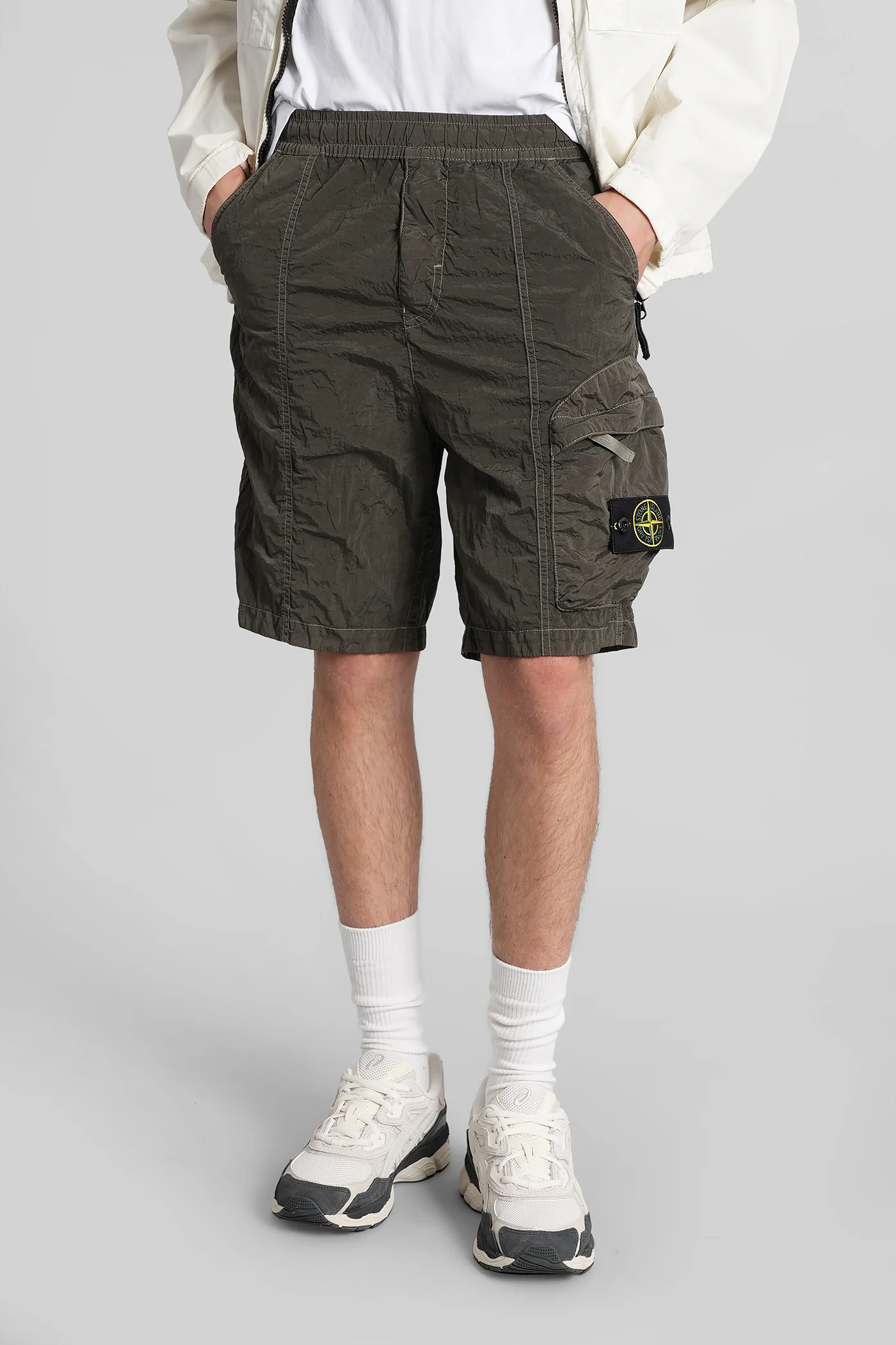 Shorts in green polyamide