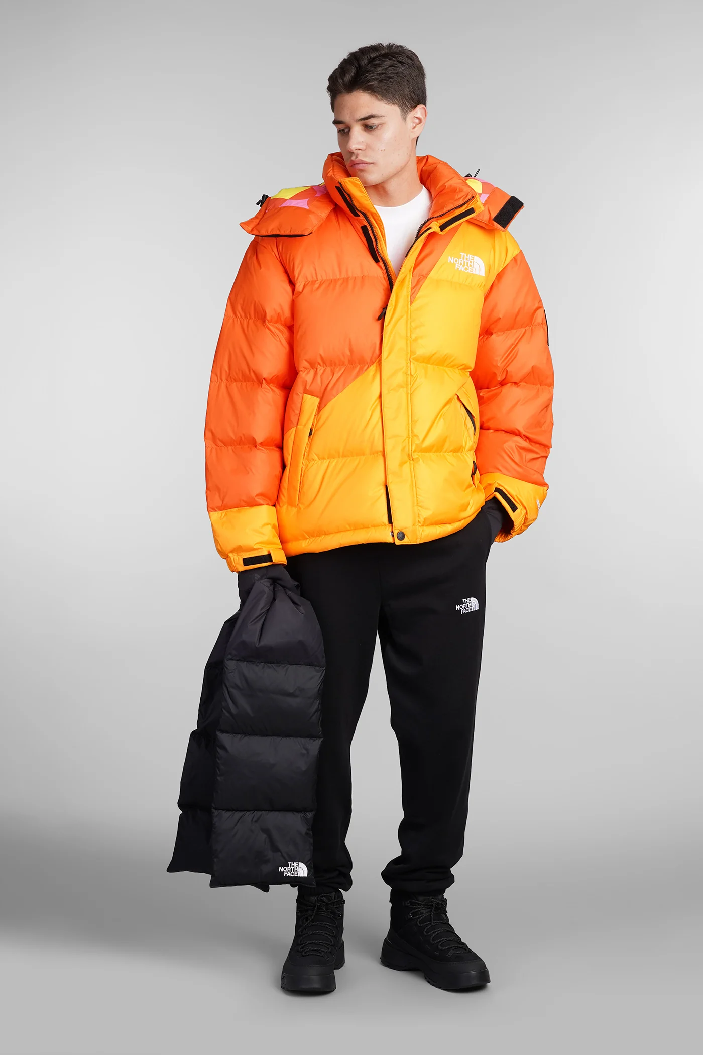 Tnf X Yi Down puffer in orange leather - Image 2
