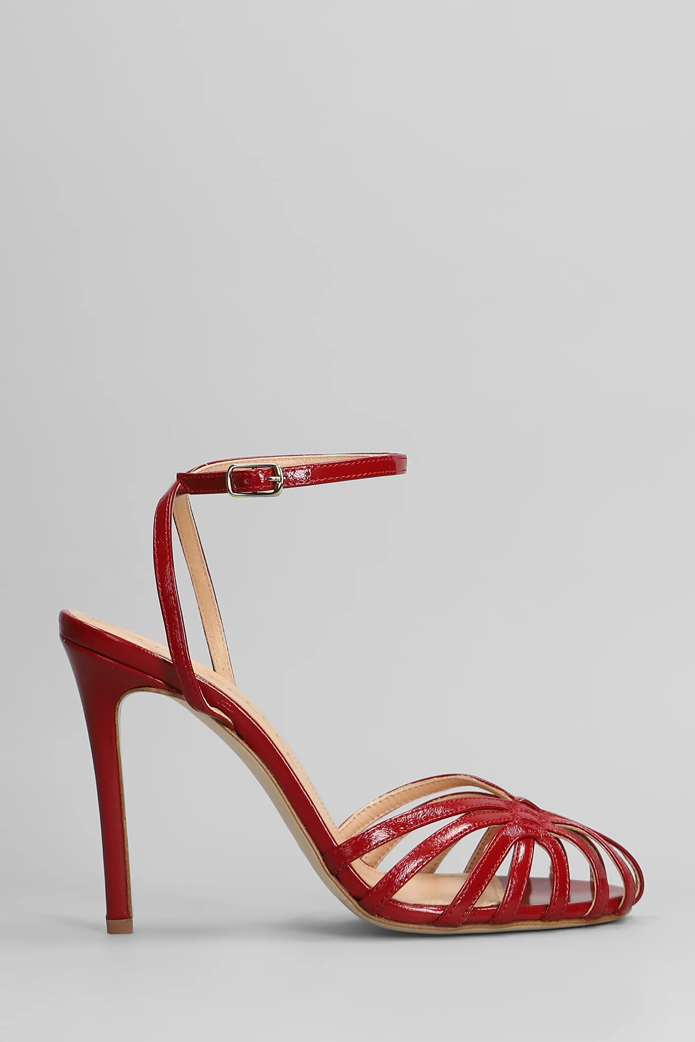 Sandals in red leather