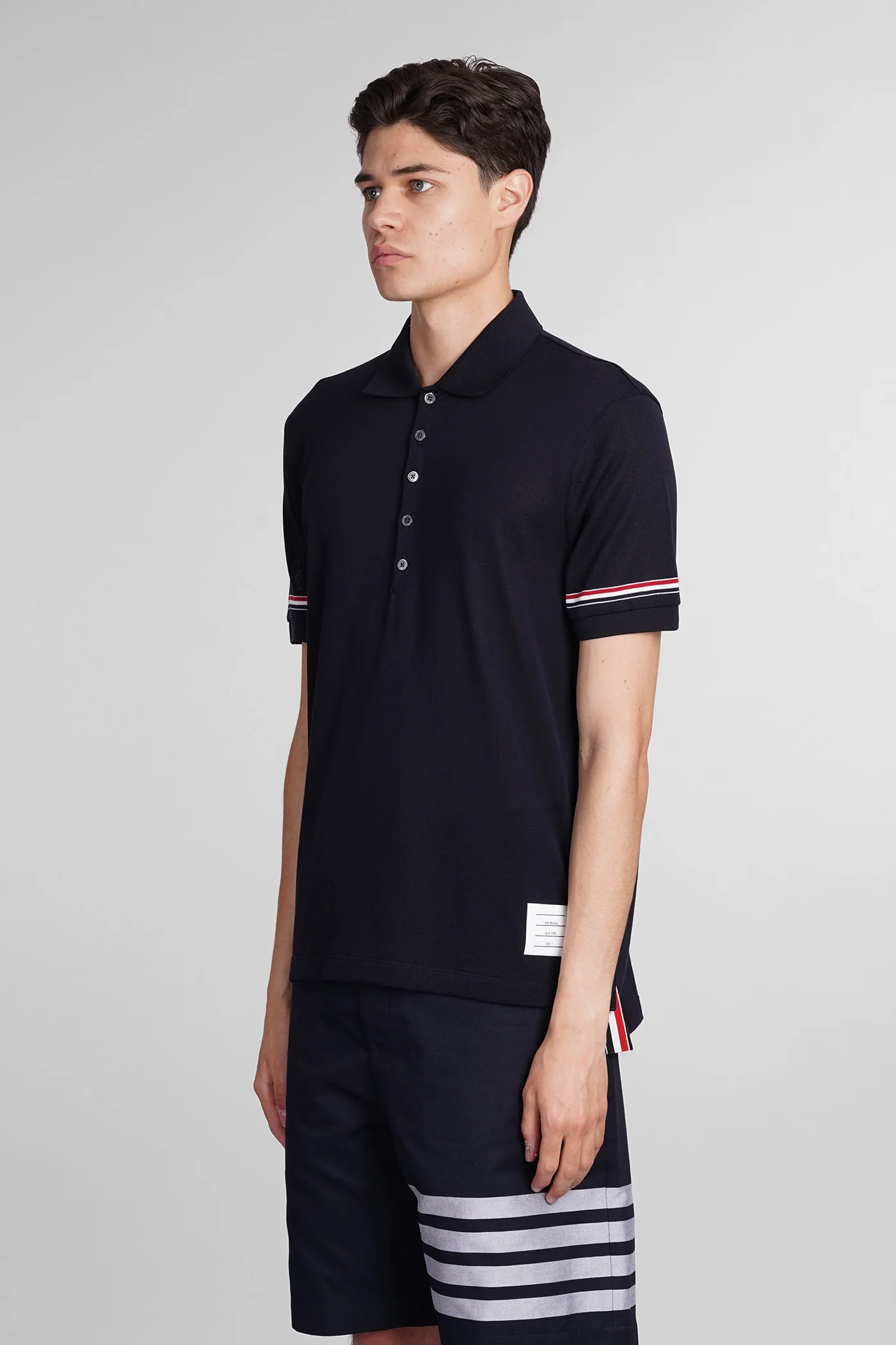 Polo in blue cotton - Image 4
