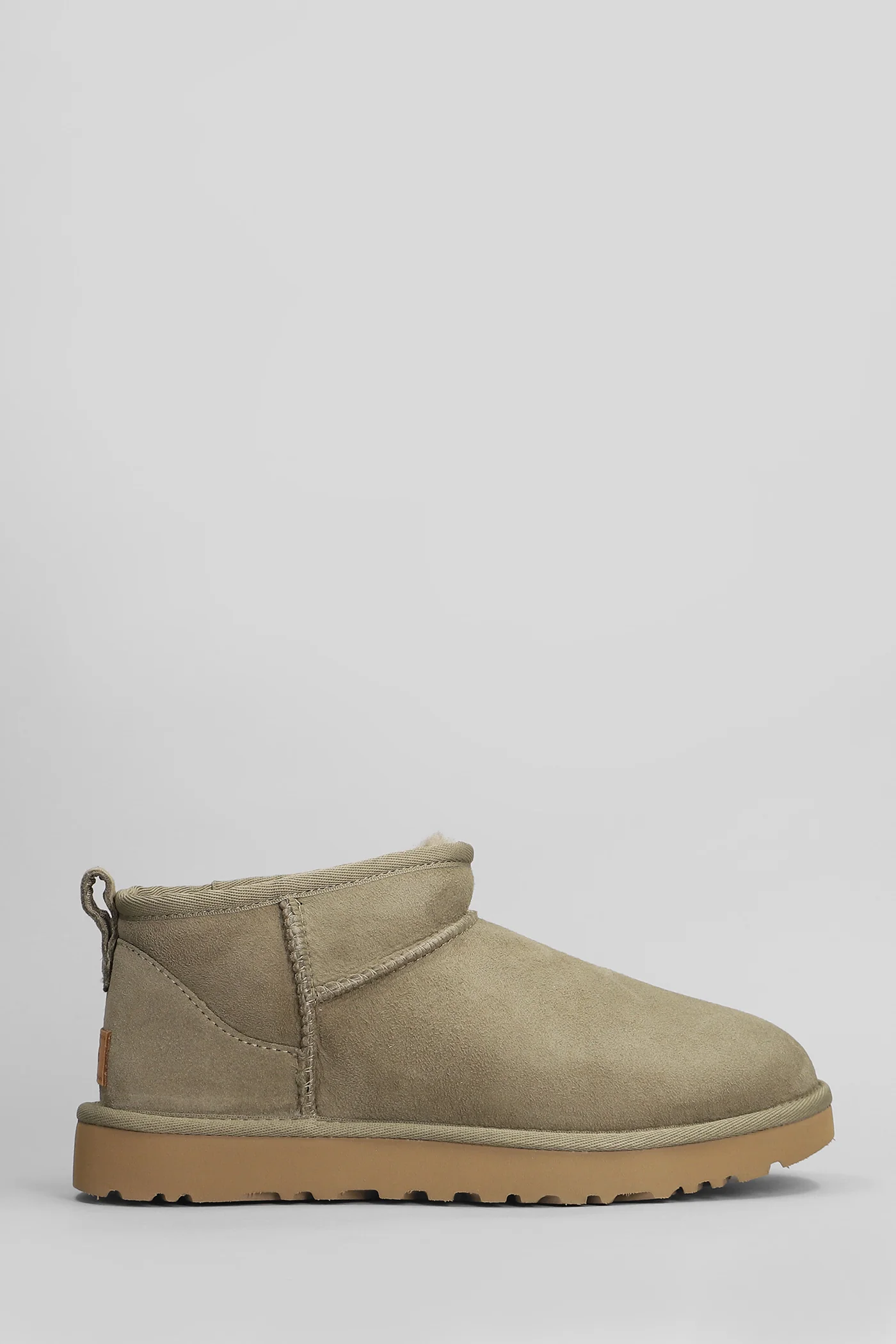 Classic Ultra Mini low heels Ankle boots in green suede